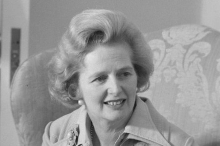 A black and white photograph of Margaret Thatcher